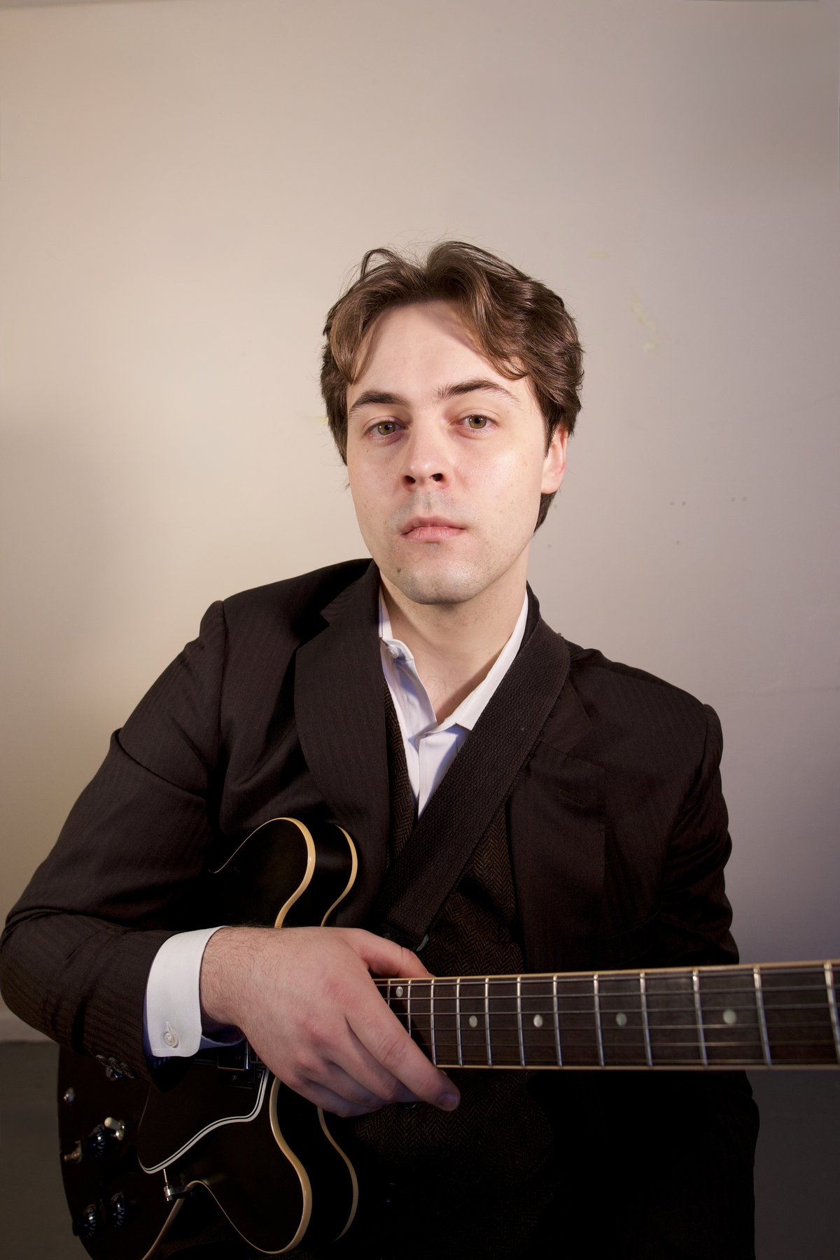 Walker with his archtop guitar